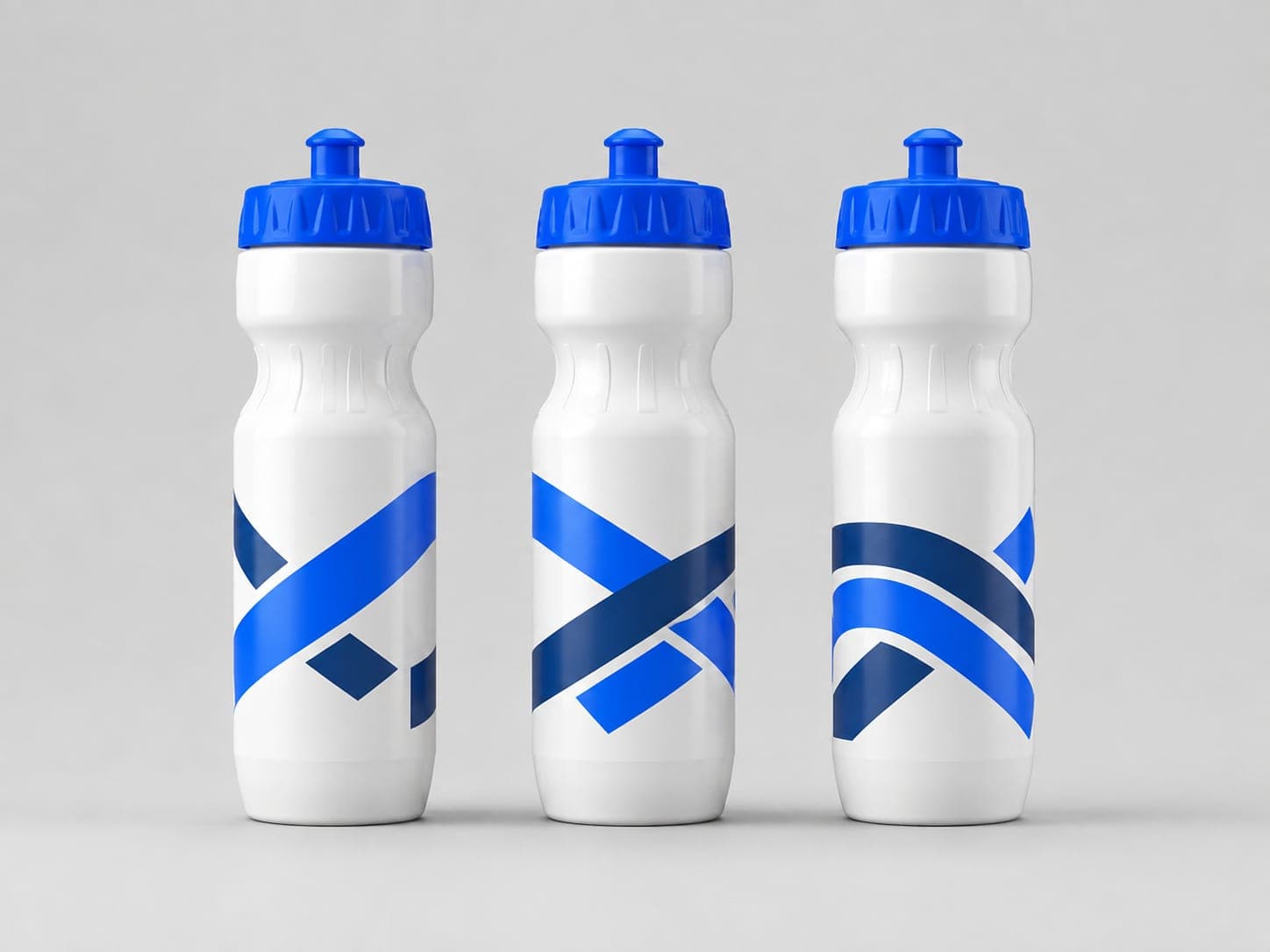 The same water bottle in three rotated views side by side, showing how the design runs around the bottle body with no beginning and no end